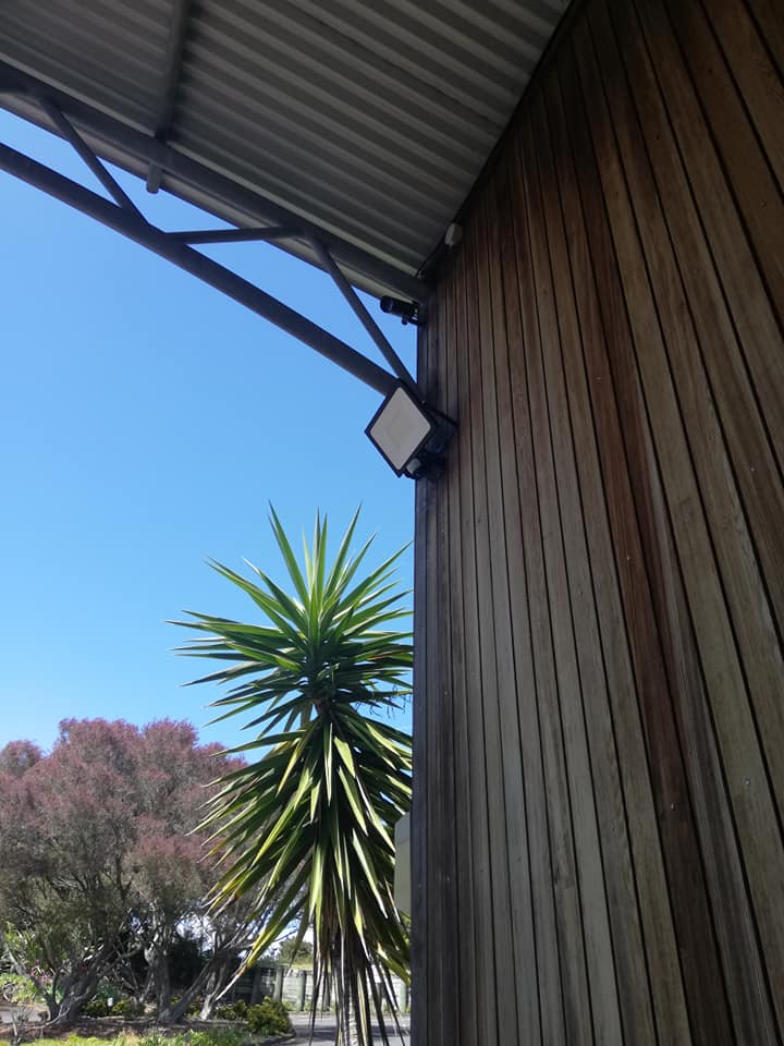 Bright and secure commercial outdoor lighting on a building exterior