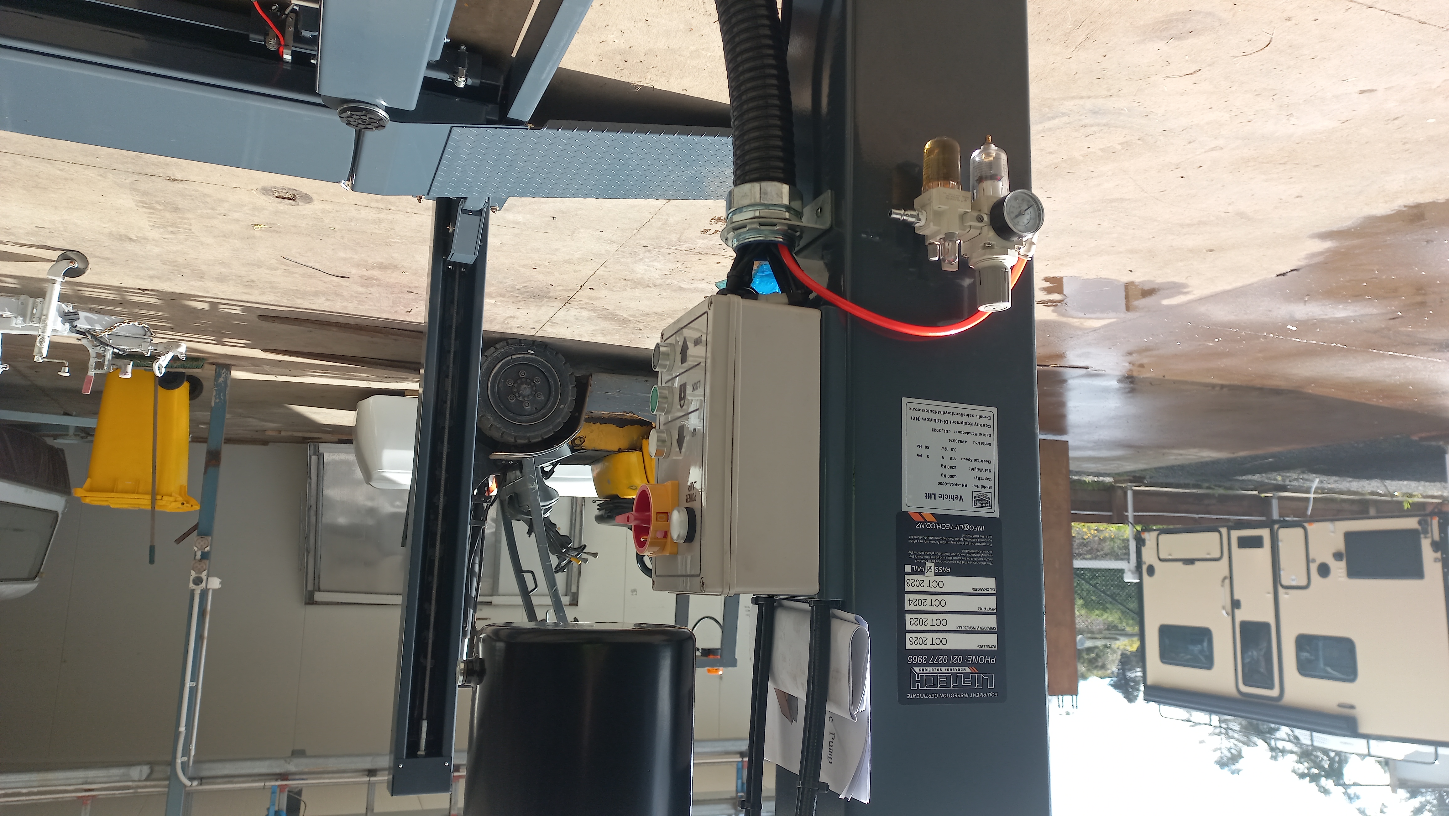 Electrician performing service and maintenance on commercial equipment