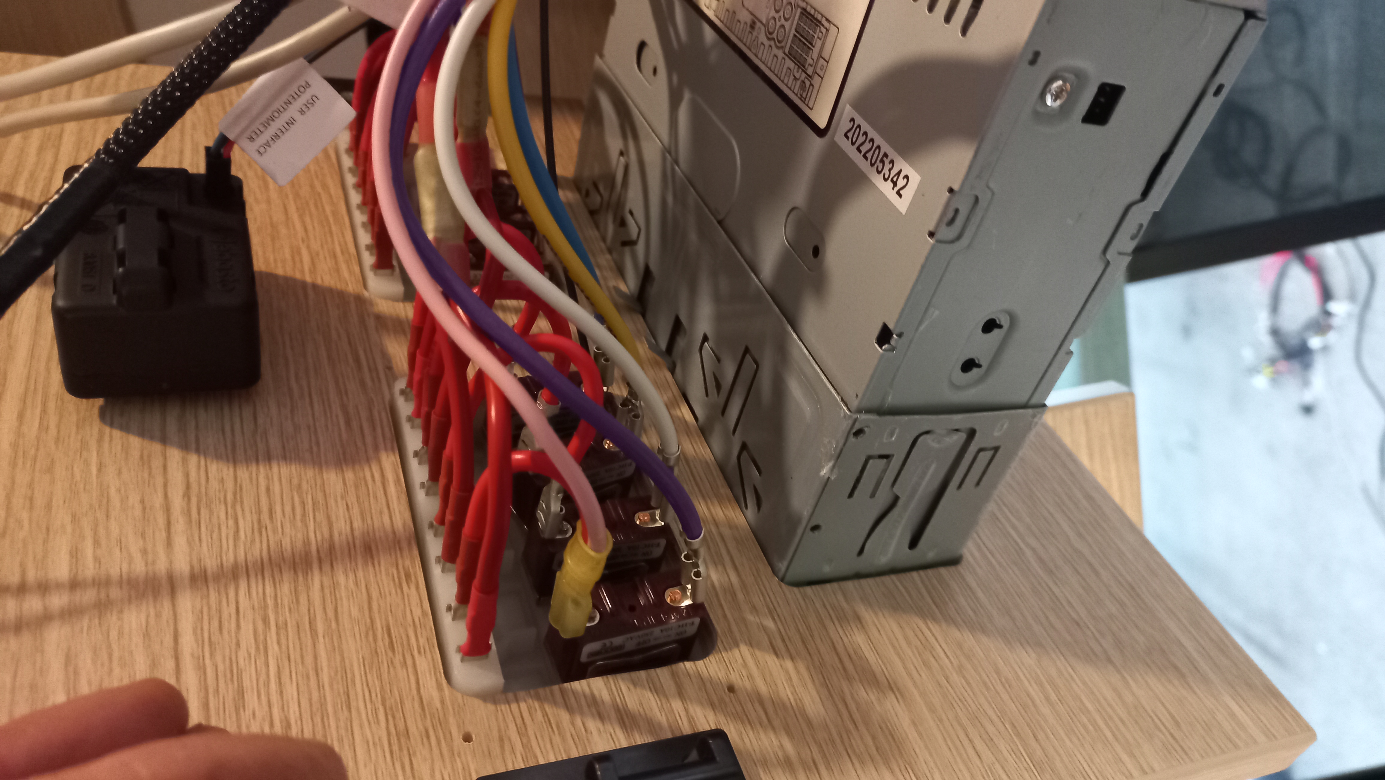 AC power outlet and control panel inside a modern caravan