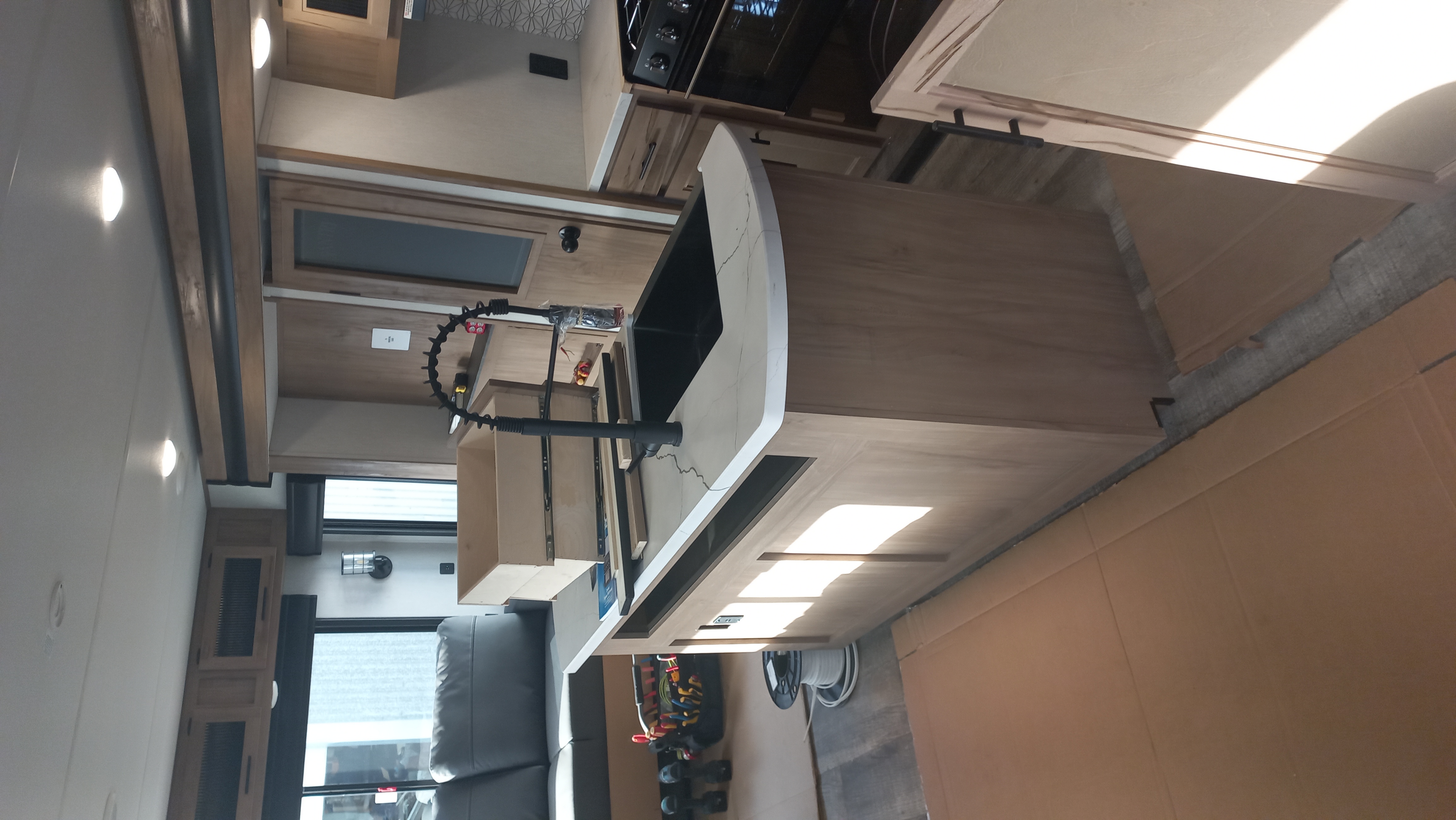 Inspector verifying the electrical safety of a motorhome for EWOF