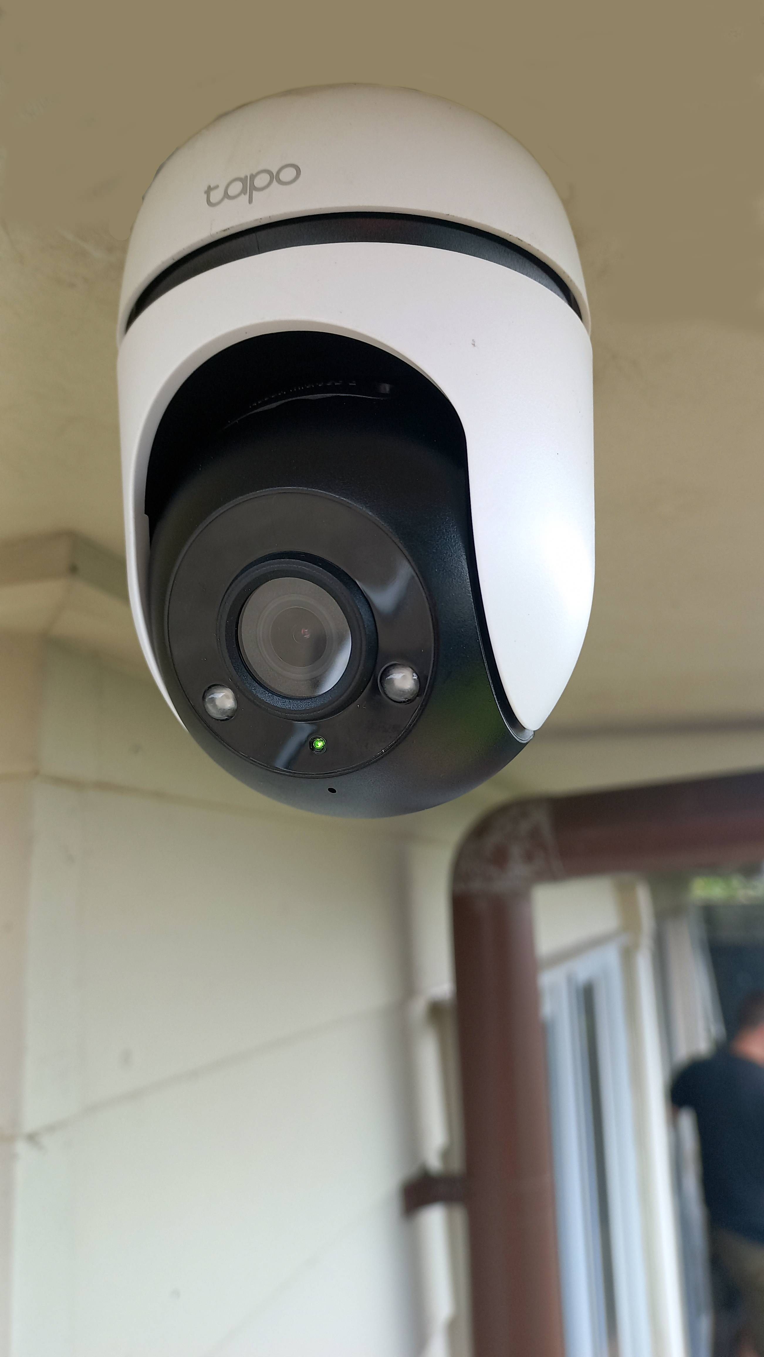 A high-definition CCTV camera mounted on a house for security