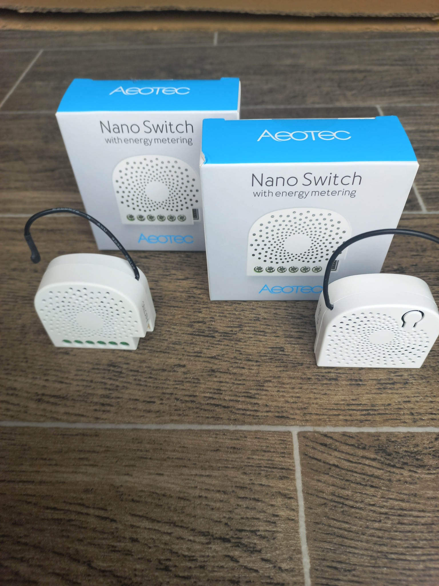 A person controlling their home's lighting and temperature from a smartphone