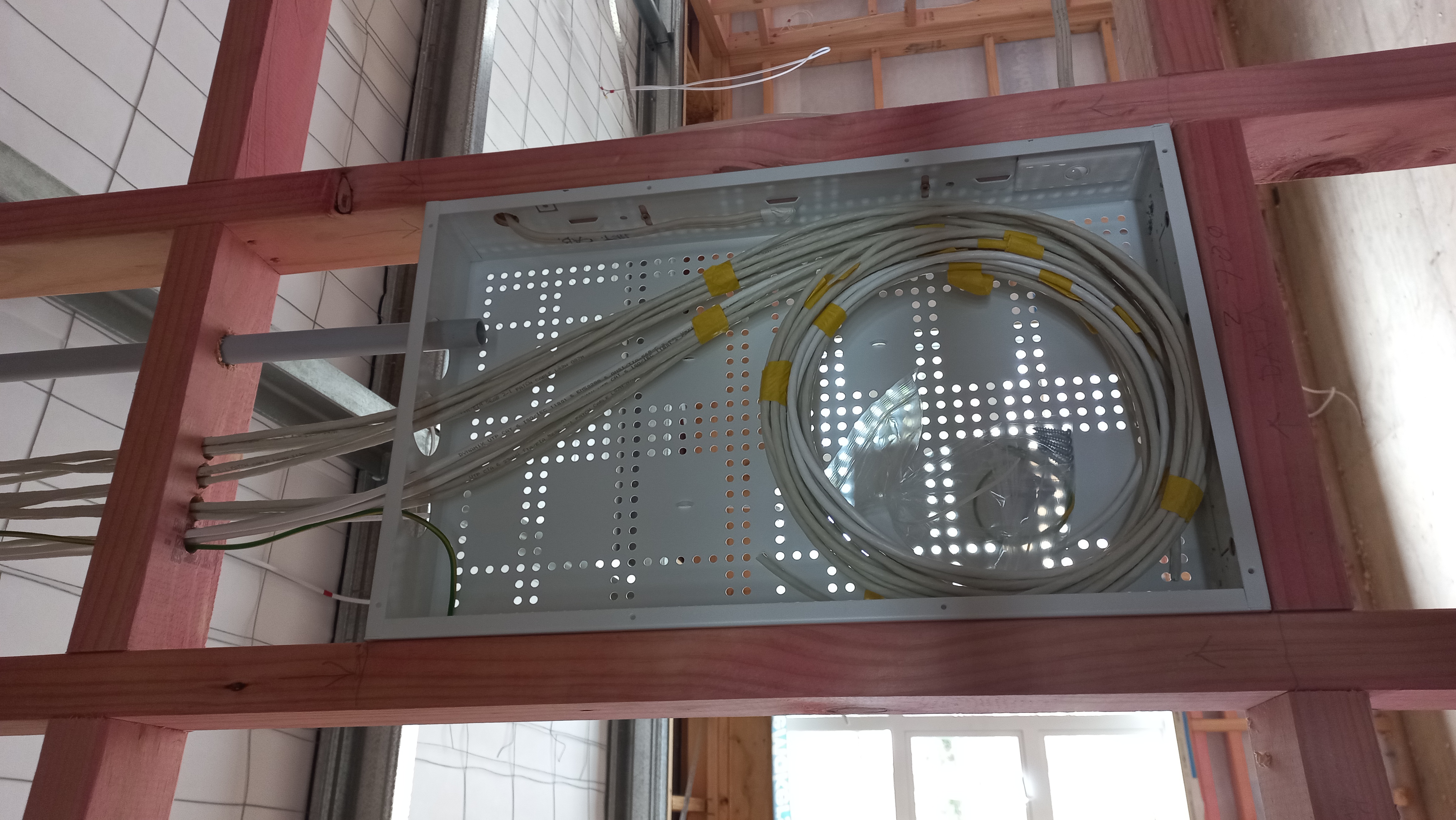 Neatly organized data and network cables in a home office setup